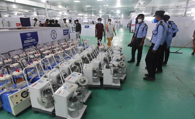 NEW DELHI, INDIA - MAY 11: Medical equipment being brought in and set up at the Covid-19 care centre and ICU facility coming up at Ramlila Maidan near GTB Hospital at Dilshad Garden on May 11, 2021 in New Delhi, India. (Photo by Raj K Raj Hindustan Times) 500-ICU Bed Covid Care Centre At Ramlila Maidan Near GTB Hospital
