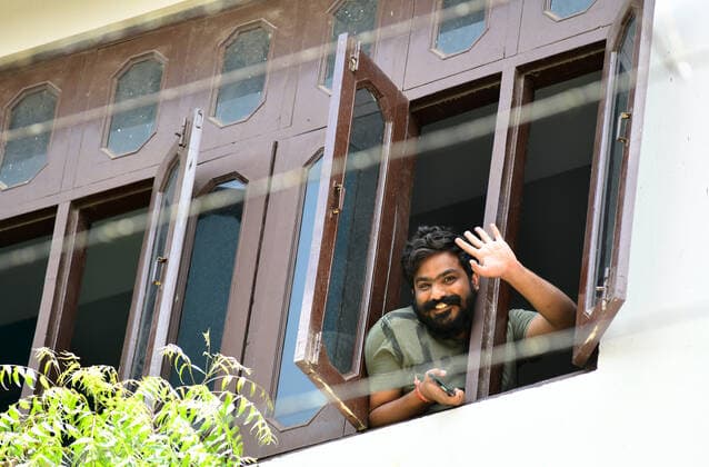 India: Daily Life amid COVID-19 lockdown in Rajasthan Resident look out from window of his house during lockdown imposed by state government to curb the surge in COVID-19 cases, in Beawar. Beawar Rajasthan India Copyright: SumitxSaraswat