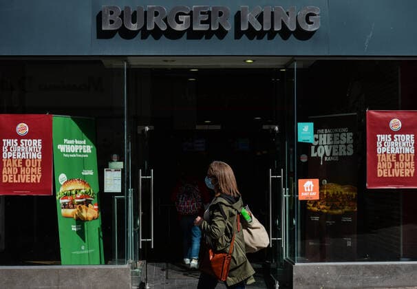 Daily Life In Dublin A woman wearing a face mask walks past Burger King restaurant on Grafton Street in Dublin. On Thursday, 13 May 2021, in Dublin, Ireland. Dublin Ireland widak-dailydub210513_np0bk  Copyright: xArturxWidakx