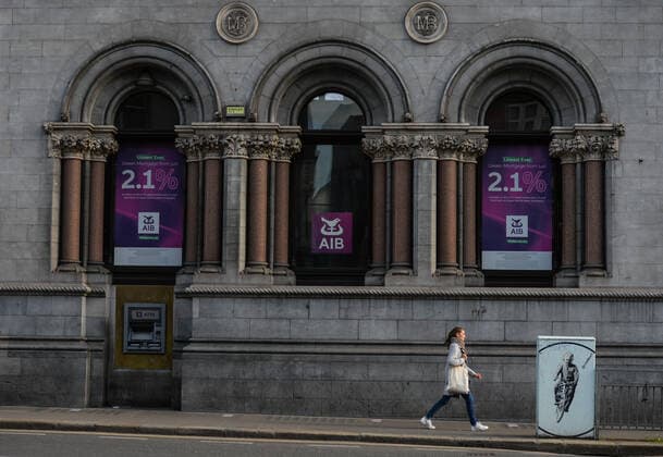 Daily Life In Dublin A woman walks past an AIB branch on Dame Street in Dublin. On Thursday, 13 May 2021, in Dublin, Ireland. Dublin Ireland widak-dailydub210513_npHhy  Copyright: xArturxWidakx