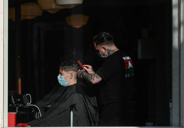 Daily Life In Dublin A hairdresser serves a customer at a barbershop in Dublin s Temple Bar. On Thursday, 13 May 2021, in Dublin, Ireland. Dublin Ireland widak-dailydub210513_npUFh  Copyright: xArturxWidakx