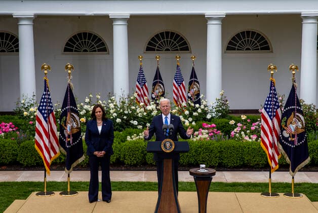 United States President Joe Biden gives remarks on the new Covid-19 Centers for Disease Control mask guidelines in the Rose Garden, at the White House in Washington, DC on Thursday, May 13, 2021. Fully vaccinated people no longer need to wear a face mask or stay six feet away from others in most settings, whether outdoors or indoors, the Centers for Disease Control and Prevention said in updated public health guidance released Thursday. US Vice President Kamala Harris stands at left. Copyright: xPoolxviaxCNPx MediaPunchx