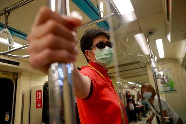May 14, 2021, Taipei, Taipei, Taiwan: People wear face mask on subway trains in Taipei, where Covid-19 carriers have visited to, as Taiwan recorded 29 more domestic cases on Friday following a cluster with no clear source of infections. Taiwan Central Epidemic Control Center has raised the Covid alert to a higher level, suspending large gatherings, activities and make eating or drinking prohibited on public transports. Taipei Taiwan - ZUMAs313 20210514_zip_s313_005 Copyright: xDanielxCengxShou-Yix