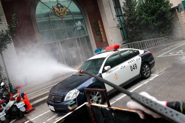 May 14, 2021, New Taipei, New Taipei, Taiwan: Disinfection team sanitize the popular tourist spot Hunglidi Mountain in New Taipei, as Taiwan recorded 29 more domestic cases on Friday following a cluster with no clear source of infections. Taiwan Central Epidemic Control Center has raised the Covid alert to a higher level, suspending large gatherings, activities and make eating or drinking prohibited on public transports, and some local governments have beefed up sanitisation measures. New Taipei Taiwan - ZUMAs313 20210514_zip_s313_009 Copyright: xDanielxCengxShou-Yix