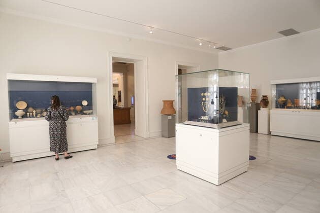 May 14, 2021, Athens, Greece: A visitor wearing a protective mask looks on Ancient Greek artifacts exhibited at Benaki museum. Museums re-opened in Greece from 14 May while citizens are allowed to stay outside until 00:30, moreover the ban on travelling from region to region is lifted on conditions, while those who want to travel to the islands, should display a coronavirus vaccination certificate. Athens Greece - ZUMAv62_ 20210514_zaf_v62_006 Copyright: xAristidisxVafeiadakisx