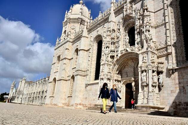 Daily Life In Lisbon Amid COVID-19 Pandemic Two women wearing protective masks walk near the Dos Jeronimos monastery in BelÃ m, Lisbon. 12 May 2021. Portugal recorded one fatality and 436 new cases of infection with the new coronavirus on Wednesday, according to the latest data from the General Health Department (DGS). Lisbon Portugal mantilla-notitle210512_npB3v  Copyright: xJorgexMantillax