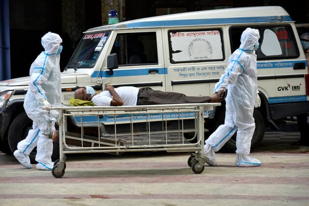 Coronavirus Emergency In Kolkata A covid-19 patient admits in a government hospital government hospital in Kolkata, India, 12 May, 2021. Kolkata India aditya-notitle210512_npIoj  Copyright: xIndranilxAdityax