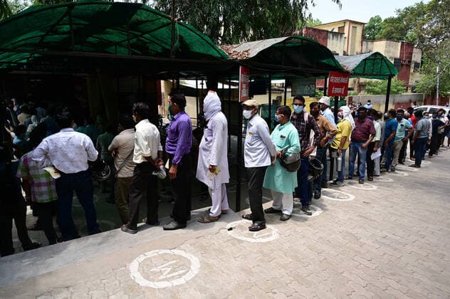 May 15, 2021, Prayagraj, Uttar Pradesh, India: Prayagraj: Citizen stand in queue to take a dose of COVID-19 vaccine at Tej Bahadur Sapru District Hospital in Prayagraj on Saturday, May 15, 2021. Prayagraj India - ZUMAv115 20210515_zap_v115_002 Copyright: xPrabhatxKumarxVermax