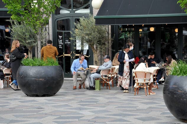 Copenhagen, Denmark. 15 May 2021,Oudoor food and drink seervice in danish cafes and bars and restaurant on hojbro plads and stroget on amager torv in danish capital. (Photo..Francis Joseph Dean Deanpictures)