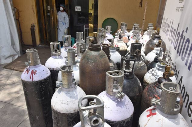 NEW DELHI, INDIA MAY 16: Oxygen cylinders at the Covid-19 Care Centre set up at Shehnai Banquet Hall attached to LNJP Hospital, on May 16, 2021 in New Delhi, India. (Photo by Raj K Raj Hindustan Times ) Daily Life Amid Coronavirus Pandemic In India