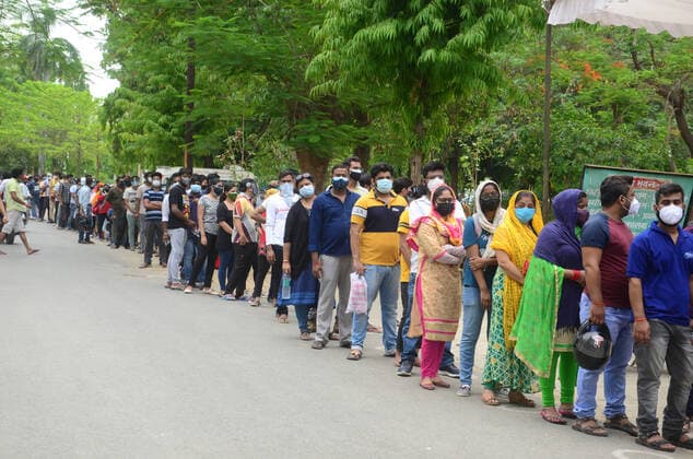 May 17, 2021, Prayagraj, Uttar Pradesh, India: Prayagraj: Beneficiaries stand in a long queue to get a dose of CORONA vaccine during second wave of CORONAVIRUS in Prayagraj on Monday, May 17, 2021. Prayagraj India - ZUMAv115 20210517_zap_v115_012 Copyright: xPrabhatxKumarxVermax
