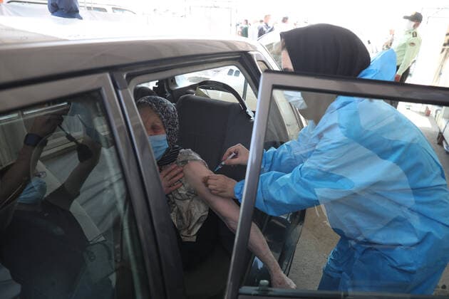 May 16, 2021, Munich, Bavaria, Germany: TEHRAN, IRAN - MAY, 16: A person receives a dose of Covid-19 vaccine at a drive-thru vaccination in iran on May 16, 2021 in Tehran, Iran. Munich Germany - ZUMAa283 20210516_zna_a283_008 Copyright: xMohammadrezaxAbbasix