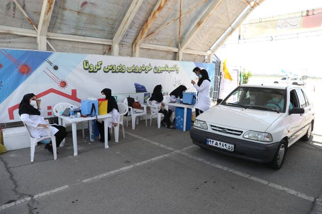 May 16, 2021, Munich, Bavaria, Germany: TEHRAN, IRAN - MAY, 16: A person receives a dose of Covid-19 vaccine at a drive-thru vaccination in iran on May 16, 2021 in Tehran, Iran. Munich Germany - ZUMAa283 20210516_zna_a283_023 Copyright: xMohammadrezaxAbbasix
