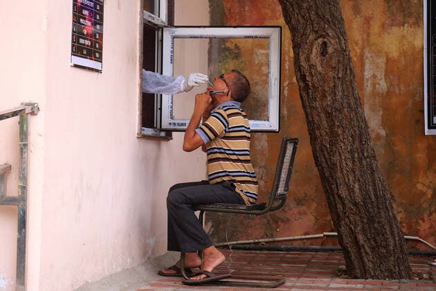 COVID-19 Testing In Jaipur A health worker collects swab sample of a man during the COVID-19 testing, amid in surge of coronavirus cases in Jaipur, Rajasthan, India, Monday, May 17,2021. Jaipur Rajasthan India bhatnagar-notitle210517_np9b4  Copyright: xVishalxBhatnagarx