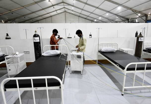 GURUGRAM, INDIA - MAY 17: A Covid Care Facility still being set-up a day after it was inaugurated by Haryana Chief Minister Manohar Lal Khattar at Tau Devi Lal stadium on May 17, 2021 in Gurugram, India. (Photo by Vipin Kumar Hindustan Times) Covid Care Facility At Tau Devi Lal Stadium