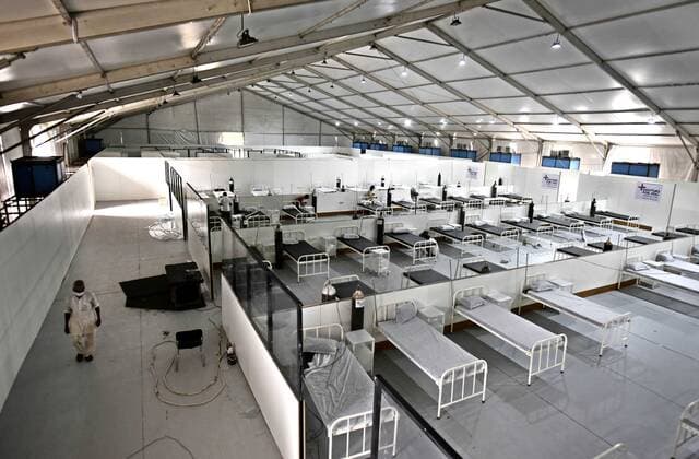 GURUGRAM, INDIA - MAY 17: A Covid Care Facility still being set-up a day after it was inaugurated by Haryana Chief Minister Manohar Lal Khattar at Tau Devi Lal stadium on May 17, 2021 in Gurugram, India. (Photo by Vipin Kumar Hindustan Times) Covid Care Facility At Tau Devi Lal Stadium