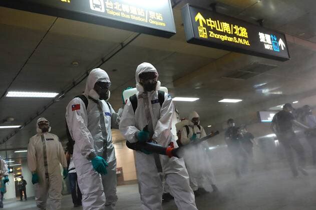 May 18, 2021, Taipei, Taipei, Taiwan: Military officers wearing personal protective equipment disinfect a major subway station in Taipei, as Taiwan has seen a dramatic increase in the number of locally acquired cases. The capital and New Taipei, where domestic cases were largely reported, have imposed stricter restrictions including suspending large scale activities, asking people to wear a mask outdoor, and forcing non essential businesses to close for curbing the spread of the coronavirus. Taipei Taiwan - ZUMAs313 20210518_zip_s313_006 Copyright: xDanielxCengxShou-Yix