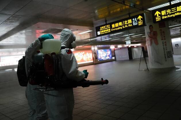 May 18, 2021, Taipei, Taipei, Taiwan: Military officers wearing personal protective equipment disinfect a major subway station in Taipei, as Taiwan has seen a dramatic increase in the number of locally acquired cases. The capital and New Taipei, where domestic cases were largely reported, have imposed stricter restrictions including suspending large scale activities, asking people to wear a mask outdoor, and forcing non essential businesses to close for curbing the spread of the coronavirus. Taipei Taiwan - ZUMAs313 20210518_zip_s313_014 Copyright: xDanielxCengxShou-Yix