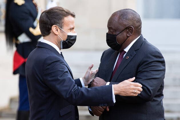 Paris, France, May 17, 2021 - France s President Emmanuel Macron welcomes South Africa s President Cyril Ramaphosa upon his arrival for a dinner at the Elysee Presidential Palace, following an international conference on Sudan which aims to provide financing breathing room for its Prime Minister as he pursues economic reforms. The French government promised to lend $1.5 billion to Sudan to help it pay off its massive foreign debt, kicking off an international summit aimed at helping the aspiring democracy emerge from decades of authoritarian rule.  Copyright: xAlexisxSciardx