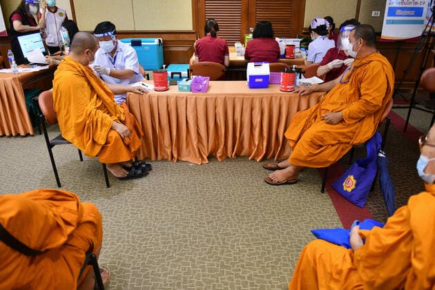 Thailand: Vaccination against COVID-19 for Buddhist monks in Bangkok A Thai Buddhist monk reacts as he receives a shot of Sinovac vaccine, developed by China s firm during a vaccination drive against the COVID-19 coronavirus pandemic at the Priest Hospital in Bangkok. Bangkok Thailand Copyright: VichanxPoti