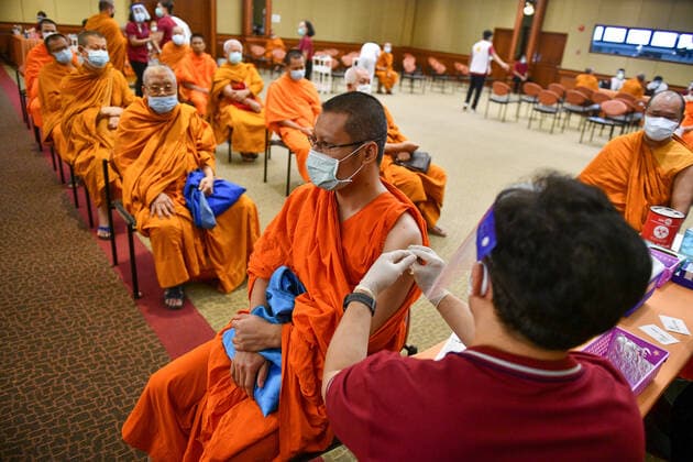 Thailand: Vaccination against COVID-19 for Buddhist monks in Bangkok A Thai Buddhist monk reacts as he receives a shot of Sinovac vaccine, developed by China s firm during a vaccination drive against the COVID-19 coronavirus pandemic at the Priest Hospital in Bangkok. Bangkok Thailand Copyright: VichanxPoti
