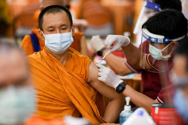 Thailand: Vaccination against COVID-19 for Buddhist monks in Bangkok A Thai Buddhist monk reacts as he receives a shot of Sinovac vaccine, developed by China s firm during a vaccination drive against the COVID-19 coronavirus pandemic at the Priest Hospital in Bangkok. Bangkok Thailand Copyright: VichanxPoti