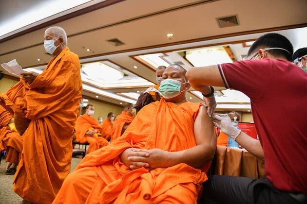 Thailand: Vaccination against COVID-19 for Buddhist monks in Bangkok A Thai Buddhist monk reacts as he receives a shot of Sinovac vaccine, developed by China s firm during a vaccination drive against the COVID-19 coronavirus pandemic at the Priest Hospital in Bangkok. Bangkok Thailand Copyright: VichanxPoti