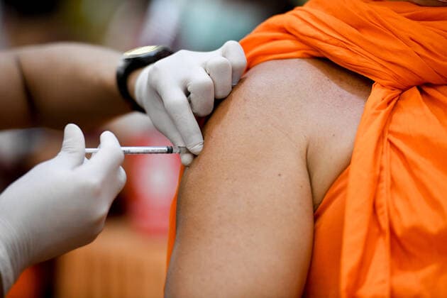 Thailand: Vaccination against COVID-19 for Buddhist monks in Bangkok A Thai Buddhist monk reacts as he receives a shot of Sinovac vaccine, developed by China s firm during a vaccination drive against the COVID-19 coronavirus pandemic at the Priest Hospital in Bangkok. Bangkok Thailand Copyright: VichanxPoti