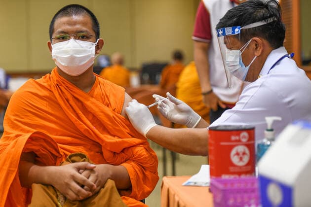 Thailand: Vaccination against COVID-19 for Buddhist monks in Bangkok A Thai Buddhist monk reacts as he receives a shot of Sinovac vaccine, developed by China s firm during a vaccination drive against the COVID-19 coronavirus pandemic at the Priest Hospital in Bangkok. Bangkok Thailand Copyright: VichanxPoti