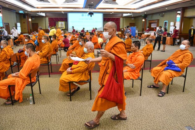 Thailand: Vaccination against COVID-19 for Buddhist monks in Bangkok A Thai Buddhist monk reacts as he receives a shot of Sinovac vaccine, developed by China s firm during a vaccination drive against the COVID-19 coronavirus pandemic at the Priest Hospital in Bangkok. Bangkok Thailand Copyright: VichanxPoti