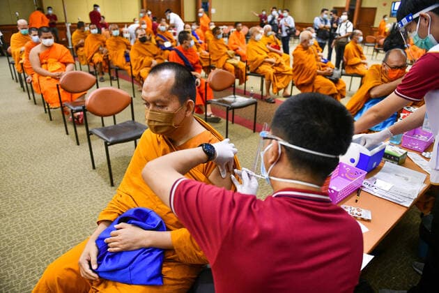 Thailand: Vaccination against COVID-19 for Buddhist monks in Bangkok A Thai Buddhist monk reacts as he receives a shot of Sinovac vaccine, developed by China s firm during a vaccination drive against the COVID-19 coronavirus pandemic at the Priest Hospital in Bangkok. Bangkok Thailand Copyright: VichanxPoti
