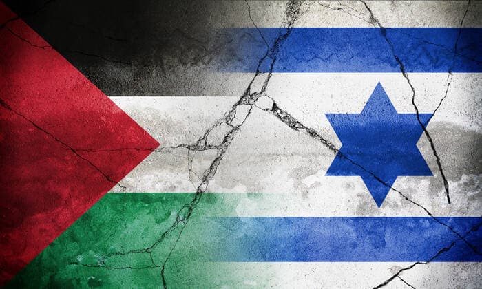 18 may 2021: Palestine and isreal conflict - country flags on a broken stone - symbol of war and conflict