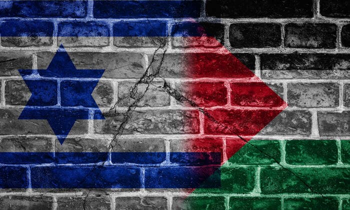 18 may 2021: Palestine and isreal conflict - country flags on a broken stone - symbol of war and conflict