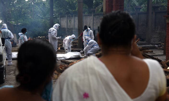 May 19, 2021, Guwahati, Guwahati, India: Relatives perform the last rites of perosn who died in COVID-19 as coronavirus surge in the state in Guwahati Assam India on Wednesday 19th May 2021. Guwahati India - ZUMAd163 20210519_zip_d163_003 Copyright: xDasarathxDekax