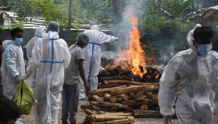May 19, 2021, Guwahati, Guwahati, India: Relatives perform the last rites of perosn who died in COVID-19 as coronavirus surge in the state in Guwahati Assam India on Wednesday 19th May 2021. Guwahati India - ZUMAd163 20210519_zip_d163_004 Copyright: xDasarathxDekax