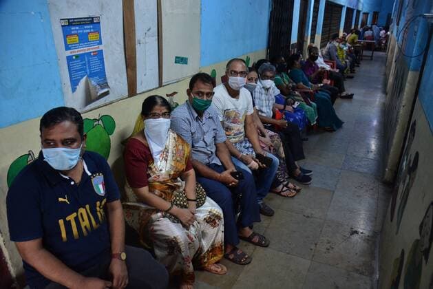 MUMBAI, INDIA ? MAY 19: Senior citizens wait in queue for Covid inoculation at TMC s C.R. Wadia Hospital as vaccination resumed after four days in Thane, on May 19, 2021 in Mumbai, India. (Photo by Praful Gangurde Hindustan Times ) COVID-19 Vaccination Drive