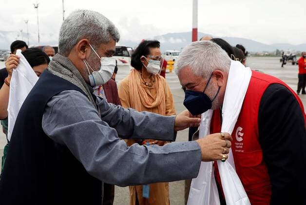 Director of the Spanish Agency for International Development Cooperation (AECID), Magdy Esteban Martínez (R), is greeted by Nepalese Health Minister, Hridayes Tripathi (L), at the airport in Kathmandu, Nepal, 20 May 2021. Spanish Foreign Office has organized a trip for Spanish and other European climbers in Nepal that will be returning to Spain next 21 May 2021 after taking to the area health material to fight the coronavirus. Spanish Foreign Office organizes the return of Spanish and other European climbers !ACHTUNG: NUR REDAKTIONELLE NUTZUNG!  Copyright: xMariscalx GRAF1779 20210520-637571062525286621