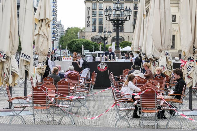 (210522) -- BERLIN, May 22, 2021 -- Guests are seen at the outdoor area of a restaurant in Berlin, capital of Germany, May 21, 2021. Restaurants in Berlin are allowed to serve guests outdoors from Friday. (Photo by Xinhua) GERMANY-BERLIN-COVID-19-RESTAURANTS StefanxZeitz 