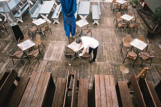 Outdoor Dinning Opens In Duesseldorf a staff cleans the tables before opening the outdoor restaurant in Duesseldorf, Germany on May 21, 2021 as Duesseldorf reopens the outdoor dinning to easing of coronavirus lockdown measures Duesseldorf Germany tang-notitle210521_npoSI  Copyright: xYingxTangx