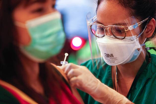 May 23, 2021, Bangkok, Thailand: A health worker inoculates a woman with the CoronaVac vaccine..Thailand has detected the South African variant of the coronavirus among a cluster of infected undocumented migrants in Narathiwat province. Independent scientists and members of the Covid-19 Network Investigations group on Saturday reported to the Public Health Ministry that they found the B.1.351 variant, commonly known as the South African strain, from samples the ministry collected from the cluster in Tak Bai district on May 13. Bangkok Thailand - ZUMAs197 20210523_zaa_s197_024 Copyright: xChaiwatxSubprasomx