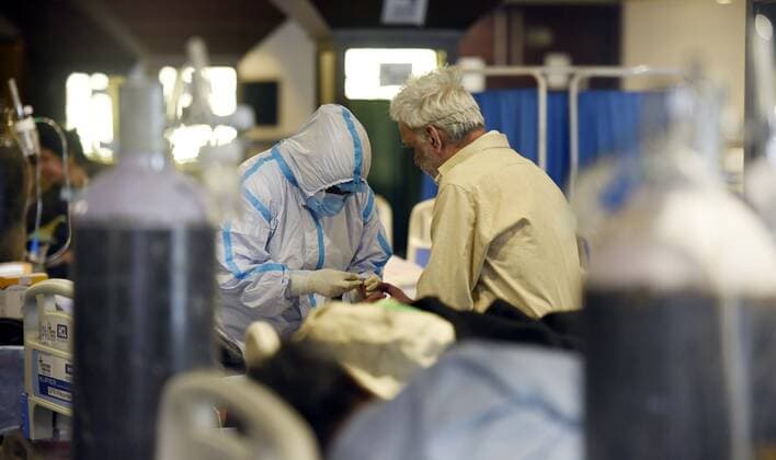 NEW DELHI, INDIA - MAY 22: An inside view of a temporary Covid Care centre at Shehnai Banquet hall, on May 22, 2021 in New Delhi, India. (Photo by Arvind Yadav Hindustan Times) Daily Life Amid Coronavirus Pandemic In India