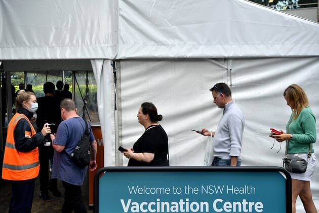 SYDNEY COVID19 VACCINATION HUB, Members of the public wait for a vaccine at a mass COVID-19 vaccination hub in Sydney, Monday, May 24, 2021. ( NO ARCHIVING, EDITORIAL USE ONLY, NO USE IN BOOKS WITHOUT CONSENT SYDNEY NSW AUSTRALIA  Copyright: xJOELxCARRETTx 20210524001544784776