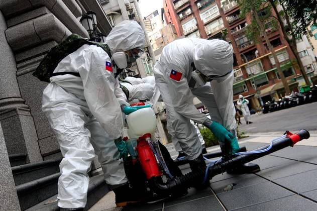 May 24, 2021, Taipei, Taipei, Taiwan: Military officers prepare before disinfecting a district in Taipei, where a quarantine hotel is opened for people tested positive for Covid-19, as TaiwanÃ¢â‚¬â ¢s number of domestic cases of Covid-19 has largely risen, following a series of community transmissions. Taipei and New Taipei on May 24 stopped dine-in services at all restaurants subsequent to the nationwide Covid-19 alert level raised last week Taipei Taiwan - ZUMAs313 20210524_zip_s313_002 Copyright: xDanielxCengxShou-Yix