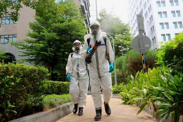 May 24, 2021, Taipei, Taipei, Taiwan: Military officers disinfect a district in Taipei, where a quarantine hotel is opened for people tested positive for Covid-19, as TaiwanÃ¢â‚¬â ¢s number of domestic cases of Covid-19 has largely risen, following a series of community transmissions. Taipei and New Taipei on May 24 stopped dine-in services at all restaurants subsequent to the nationwide Covid-19 alert level raised last week Taipei Taiwan - ZUMAs313 20210524_zip_s313_003 Copyright: xDanielxCengxShou-Yix
