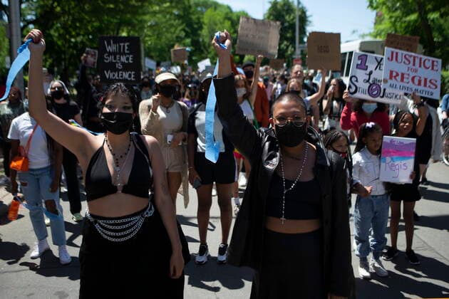 May 24, 2021, Toronto, on, Canada: Demonstrators march as they mark the first anniversary of the death of Regis Korchinski-Paquet, the 29-year-old African Indigenous woman who died in the presence of Toronto police officers, in Toronto on Monday, May 24, 2021. Toronto Canada  - ZUMAc35_ 20210524_zaf_c35_063 Copyright: xChrisxYoungx