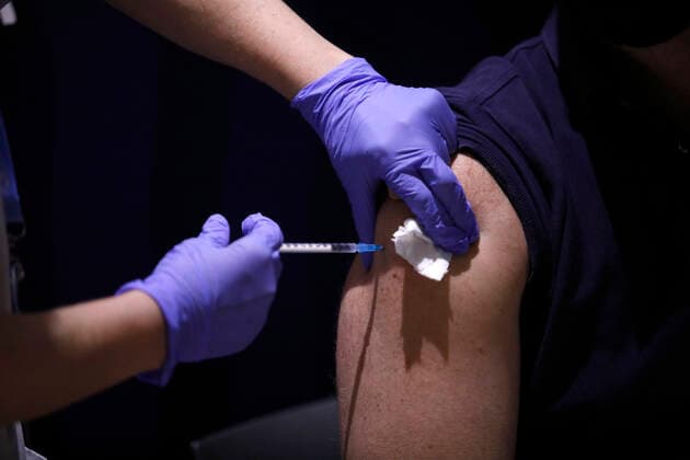A man receives the first dose of Pfizer s Covid-19 vaccine on 27 May 2021 in the Berlin Room of the Camp Nou stadium in Barcelona, Catalonia, Spain. This Thursday has opened at Camp Nou, FC Barcelona s stadium, a space for administration of vaccines against Covid-19 that will be open for three weeks. This vaccination device has been installed in the Berlin Room of the stadium, it will have four vaccination boxes and a rate of 2,500 doses per week. 27 MAY 2021;CAMP NOU;VACCINATION;COVID-19;VIRUS;HEALTH Kike Rincon LagenciaEP 05 27 2021 BARCELONA; CATALONIA BARCELONA; CATALONIA Spain Copyright: xKikexRinconx 3739486
