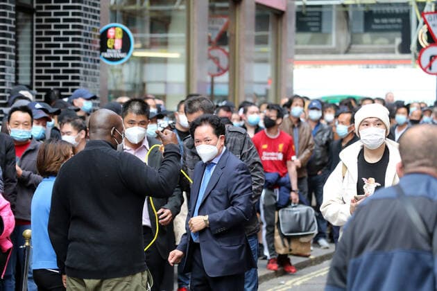 May 27, 2021, London, England, United Kingdom: Chinese people filled streets of London s Chinatown where free Covid-19 jabs were in offer for a day without appointment and any need for proof of address, ID or NHS records. London United Kingdom - ZUMAs262 20210527_zip_s262_019 Copyright: xTayfunxSalcix