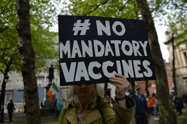 Anti-Vaccination Protest In Dublin A protester holds a placard during an anti-Vaccination, anti-mask and anti-pandemic protest in the center of Dublin. On Thursday, 27 May 2021, in Dublin, Ireland. Dublin Ireland widak-antivacc210527_npGUO  Copyright: xArturxWidakx