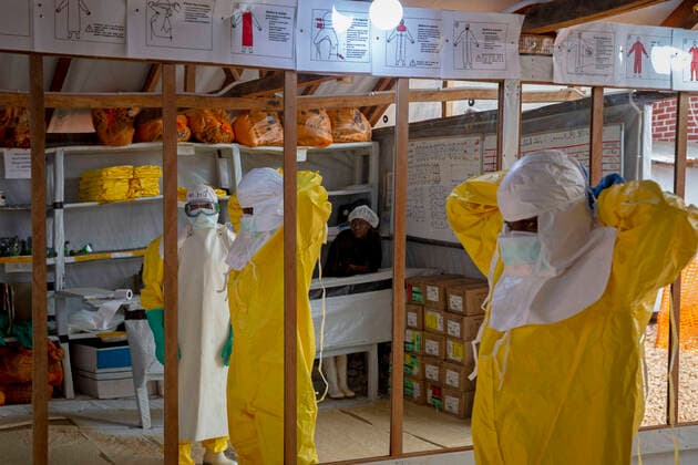 DRC, Democratic Republic of the Congo: Ebola treatment centre (ETC) in Butembo DRC, Democratic Republic of the Congo: Ebola treatment centre (ETC) in Butembo. Doctors and healthcare workers in the Ebola treatment centre run by the humanitarian medical aid organization Medecins Sans Frontieres, Doctors Without Borders. This tenth epidemic is the biggest ever recorded in DRC and is particularly worrying in the area of Butembo - Beni. Medical staff with protective clothing, full protective suits, masks, gloves and glasses Butembo Nord kivu Africa; Central Africa; Democratic Republic of the Congo  Copyright: xCloarec Andia.frx 345314