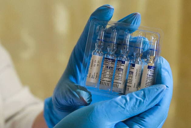 NOVOSIBIRSK, RUSSIA - MAY 29, 2021: Ampoules contain the Gam-COVID-Vac (Sputnik V) vaccine used by a mobile medical team of Novosibirsk City Polyclinic No 24 at a temporary COVID-19 vaccination site on the premises of the Berezka Allotment Association in Leninsky District. Kirill Kukhmar TASS  TS101FBB